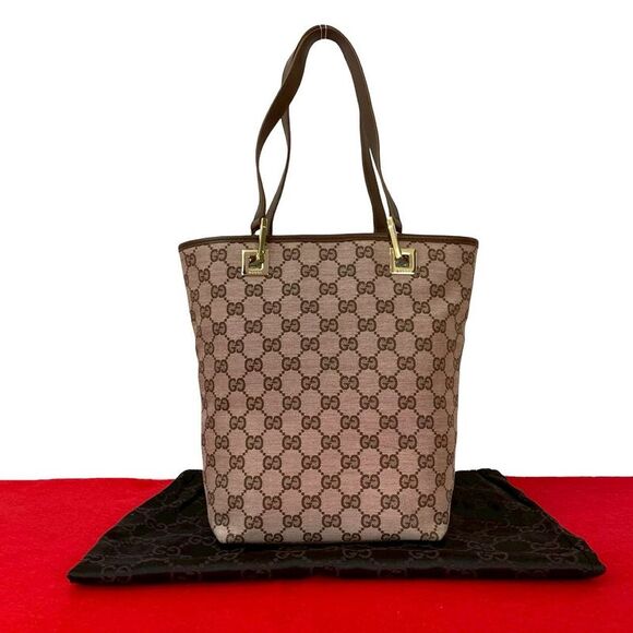 Gucci Handbags - Gucci GG Canvas Leather Tote Bag